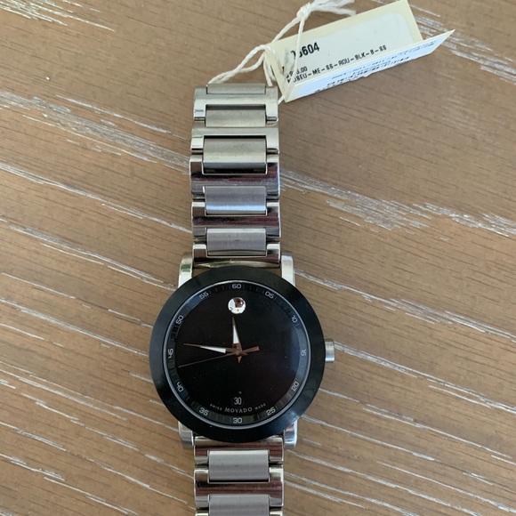 Movado Other - Mens stainless steel authentic Movado watch. Extra clasp for larger wrist.